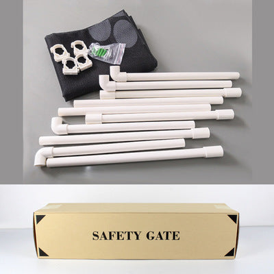 White safety gate components with packaging on a gray background