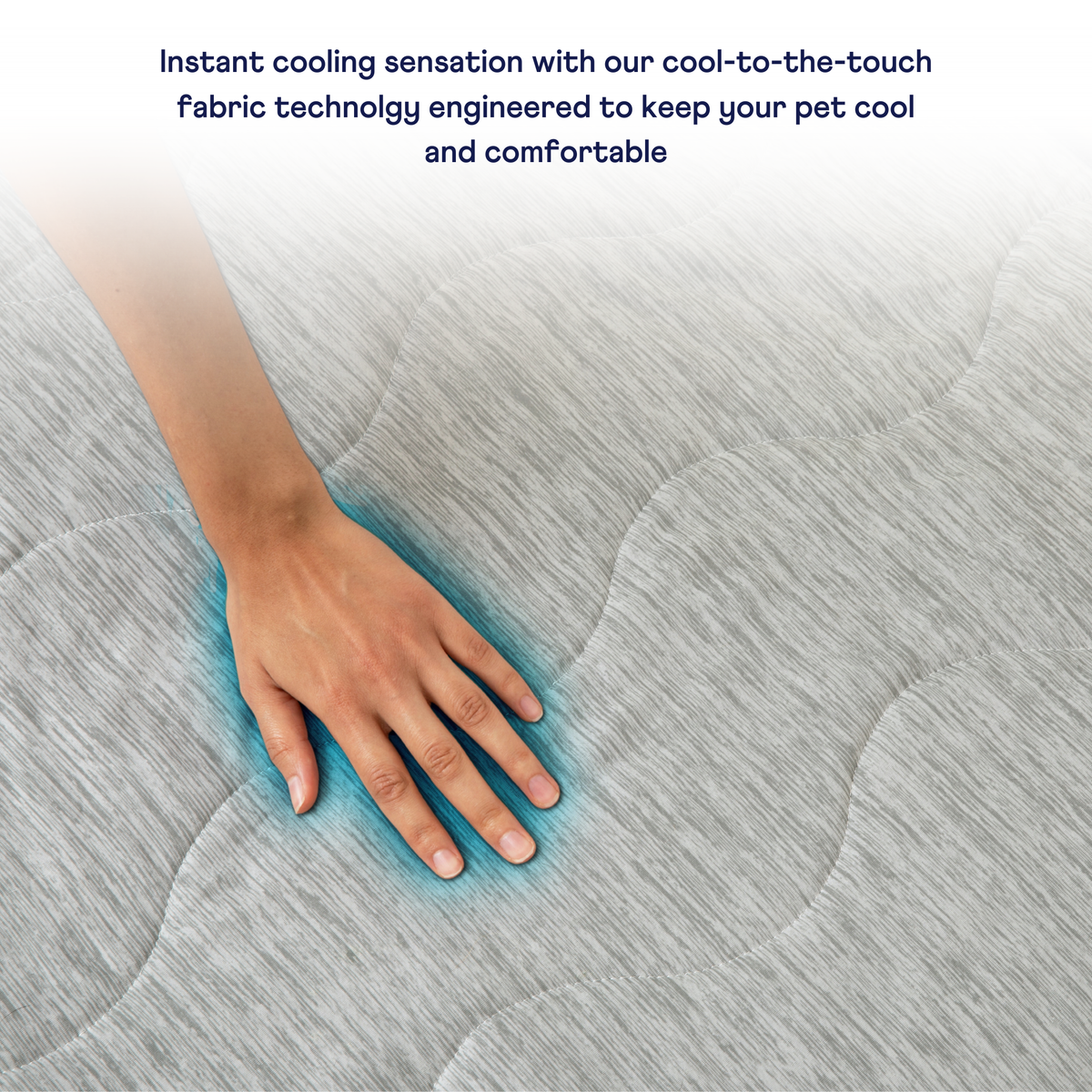 Text on a textured surface with a hand touching it, highlighting cooling fabric technology.